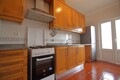 Apartamento T2 Centro Nossa Senhora do Pópulo Caldas da Rainha - cozinha equipada, marquise, varanda