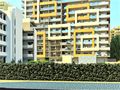 Apartamento T1 de luxo em construção Praia da Rocha Portimão à venda - equipado, garagem, sauna, piscina, banho turco, ténis, parque infantil, isolamento térmico, videovigilância, chão radiante, painéis solares, jardim, condomínio fechado, varandas