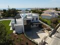 Moradia nova V4 Lagoa - Ferragudo Lagoa (Algarve) para comprar - piso radiante, garagem, varanda, terraço, ar condicionado, alarme, piscina, vista mar, painel solar