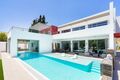House/Villa Modern V4 on sale Lagoa Vila Nova de Famalicão - alarm, swimming pool, terrace, solar panels, garden, underfloor heating, central heating, equipped, sauna, automatic irrigation system, garage, double glazing, air conditioning, barbecue