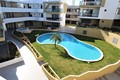 À venda Apartamento novo T1 Alvor Portimão - painéis solares, zonas verdes, equipado, varandas, piscina, condomínio fechado, garagem, ar condicionado