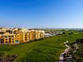 Apartamento T2 de luxo Quarteira Loulé à venda - chão radiante, alarme, piscina, ar condicionado, condomínio fechado